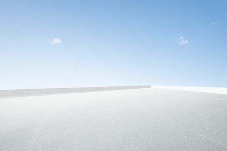Empty open space top floor with clear blue sky .の写真素材