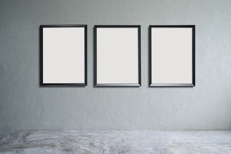 Empty cement floor and concrete wall with three empty picture frames, Interior design with Loft style .の写真素材