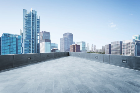 Empty open space top floor  with modern skyscraper building .の写真素材