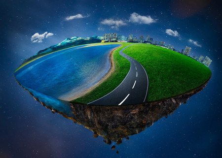 Fantasy island floating in the air with city skyline, green field, lake, mountain and curvy asphalt highway . Night scene .の写真素材