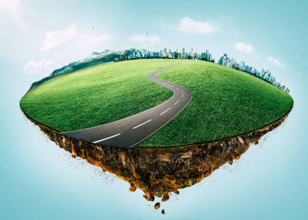 Fantasy island floating in the air with city skyline, green field, mountain and curvy asphalt highway .の写真素材