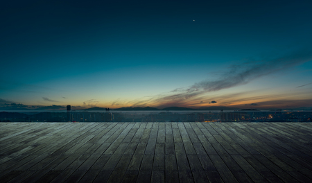 Wooden balcony terrace with early morning sky .の写真素材