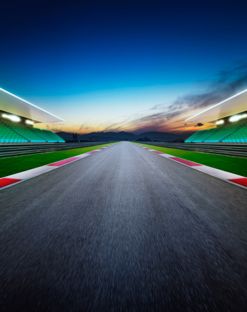 Motion blurred racetrack  . Night scene . Vertical or poster format .の写真素材