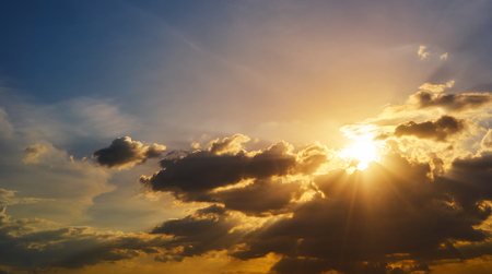 Beautiful natural sunset or sunrise  and amazing  cloud sky above it .の写真素材