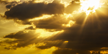 Beautiful natural sunset or sunrise  and amazing  cloud sky above it .の写真素材