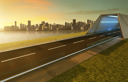 Empty asphalt road with tunnel ,greenfield and modern city skyline background . Mixed media .の写真素材