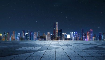 Panorama of skyscrapers in a modern city at nightの写真素材
