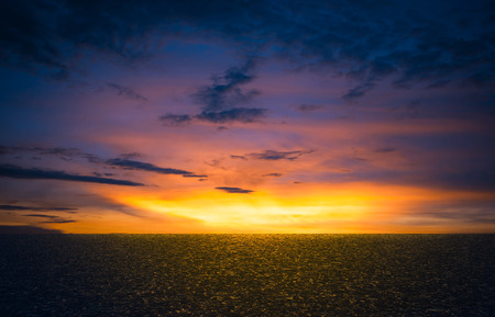 Asphalt road with dramatic sunrise sky , Horizontal format .の写真素材