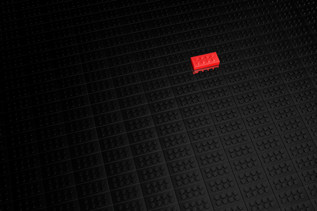 3D rendering red toy bricks standing out from crowd of black toy bricks .  Leadership, independence, initiative, strategy, dissent, think different, uniqueness ,business success concept .の写真素材