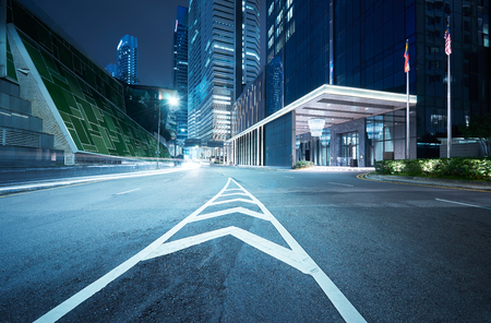 Modern building with light trails on night scene  backgroundの写真素材