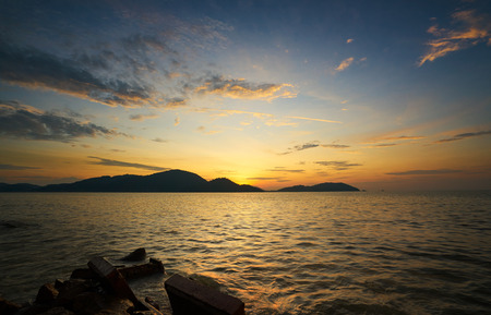 Sunset on seaside in Pangkor island. Beautiful travel destination for summer vacation.の写真素材