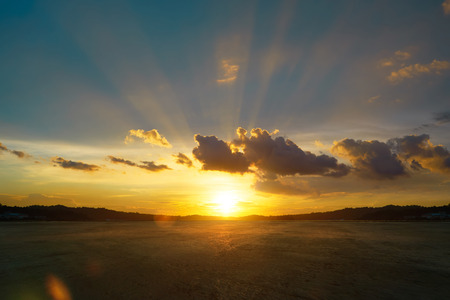Empty concrete cement floor with beautiful and dramatic golden hour  sunset sky .の写真素材