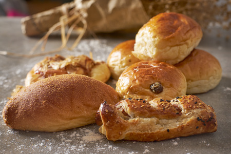Fresh bake bread and buns on the table. Food concept .の写真素材