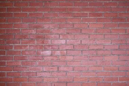 Red shining brick wall texture background .の写真素材