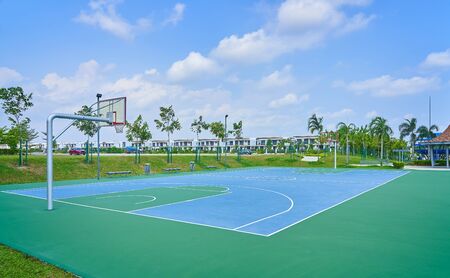 Outdoor open basketball court under sunny sky . Healthy lifestyle sport background .の写真素材