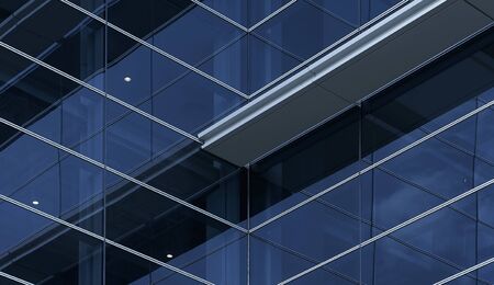 Abstract steel and glass facade detail background of high rise commercial building .Business or industrial successful concept background .の写真素材