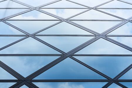 Modern architecture business building details steel and glass facade background .の写真素材