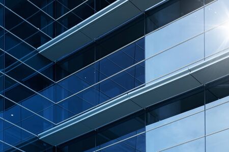 Abstract steel and glass facade detail background of high rise commercial building .Business or industrial successful concept background .の写真素材