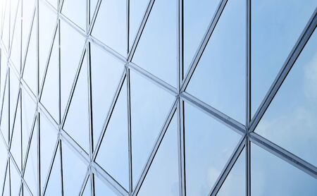 Modern architecture business building details steel and glass facade background .の写真素材