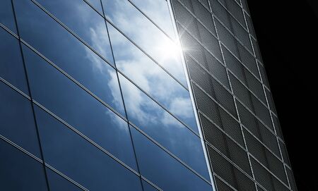 Abstract steel and glass facade detail background of high rise commercial building .Business or industrial successful concept background .の写真素材