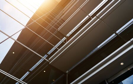 Abstract steel and glass facade detail background of high rise commercial building .Business or industrial successful concept background .の写真素材