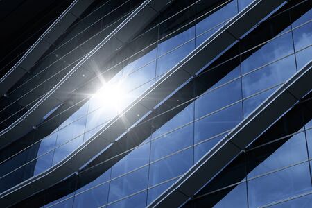 Abstract steel and glass facade detail background of high rise commercial building .Business or industrial successful concept background .の写真素材