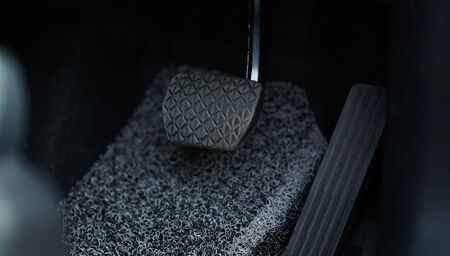 Vehicle interior of a modern car with brake and accelerator pedal of a carの写真素材