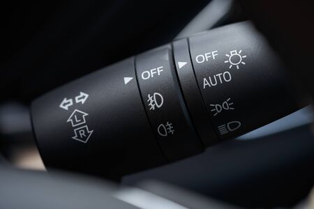Vehicle interior of a modern car with light control switchの写真素材