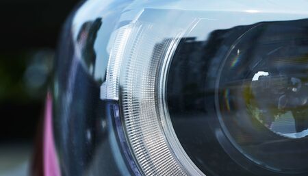 Close up detail of the rear light of a headlightの写真素材