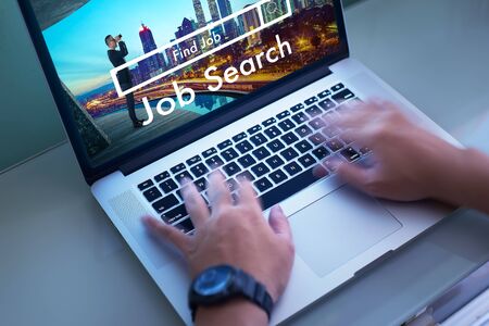 Man browsing human resources recruitment website. Seeker looking for new vacancies .の写真素材