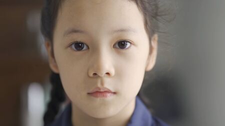 Beautiful asian little girl portrait, close upの写真素材