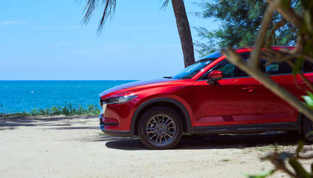 Kuala Lumpur, Malaysia-July 11, 2019: New red Mazda CX 5 crossover SUV park at beach side. Mazda CX 5 is one of Malaysian favorite SUV car.のeditorial素材