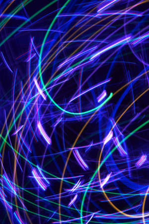 Abstract colorful glowing Impulse curved path of a orbit light background. Vertical formatの写真素材