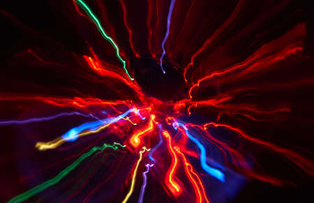 Abstract red glowing Impulse radiation and flow light backgroundの写真素材