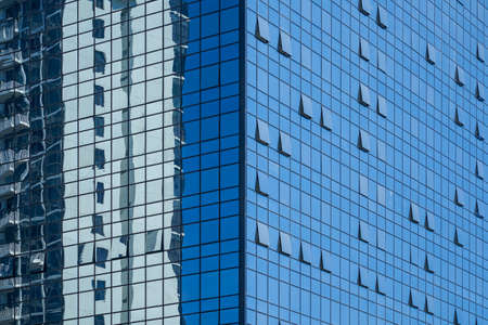 Closeup glass facade of office skyscraper buildingの写真素材