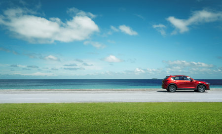 Kuala Lumpur, Malaysia-July 21, 2020: New red Mazda CX 5 crossover SUV park at seacoast with...