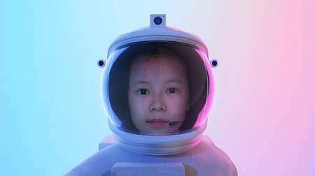 Portrait of adorable little cute girl Astronautの写真素材