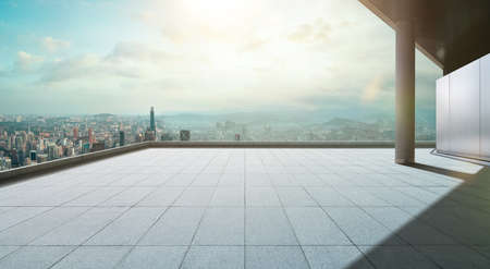 Perspective view of empty concrete tiles floor of rooftop with city skyline, Morning scene