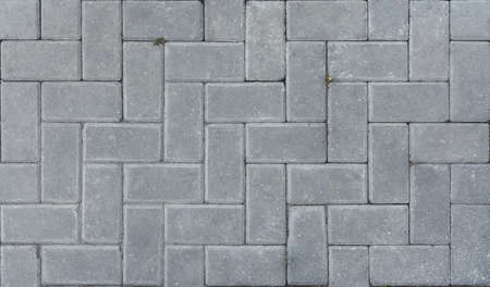 Gray paver brick stone floor texture backgroundの写真素材