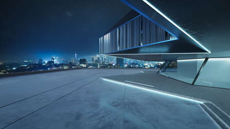 Perspective view of empty cement floor with steel and glass modern building exterior. Night scene. Photorealistic 3D rendering.の写真素材