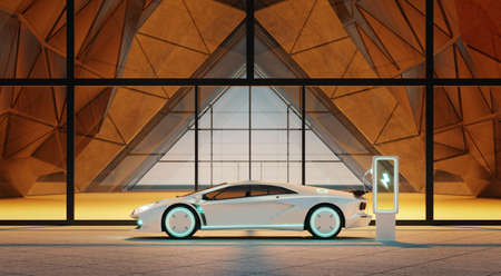 The unbranded general concept sports car is parked in front of the modern triangular design building. 3d renderingの写真素材