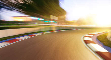 Motion blurred racetrack, golden hour moodの写真素材