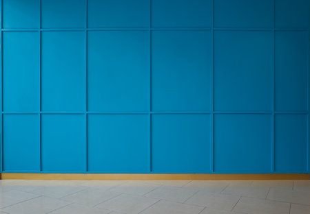 Blue wall with tiles floor backgroundの写真素材
