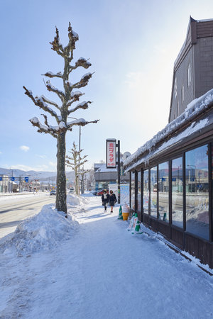 Otaru, Japan - December 19, 2022 : Snow-covered streets of Otaru. Otaru is popular tourist attractions in Hokkaido,Japanのeditorial素材