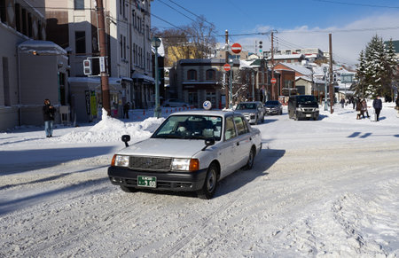 Otaru, Japan - December 19, 2022 : Snow-covered streets of Otaru. Otaru is popular tourist attractions in Hokkaido,Japanのeditorial素材
