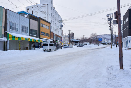 Otaru, Japan - December 19, 2022 : Snow-covered streets of Otaru. Otaru is popular tourist attractions in Hokkaido,Japanのeditorial素材