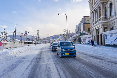 Otaru, Japan - December 19, 2022 : Snow-covered streets of Otaru. Otaru is popular tourist attractions in Hokkaido,Japanのeditorial素材