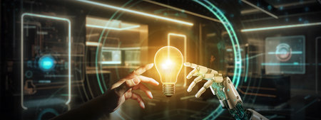 Robot hand and human hand touching light bulb together. Ai machine deep creative learning on big data network.の写真素材