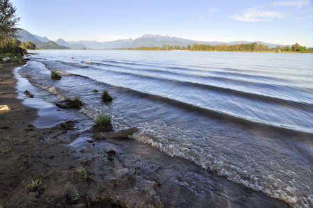 Waves on River caused by yachtの写真素材