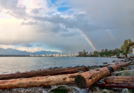 This rainbow over Vancouver city was taken from across the inletの写真素材